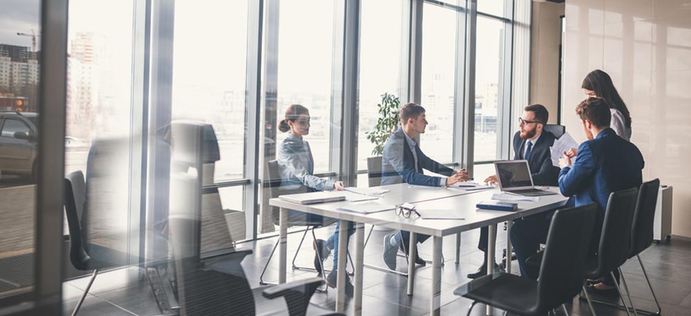 Corporate business team and manager in a meeting