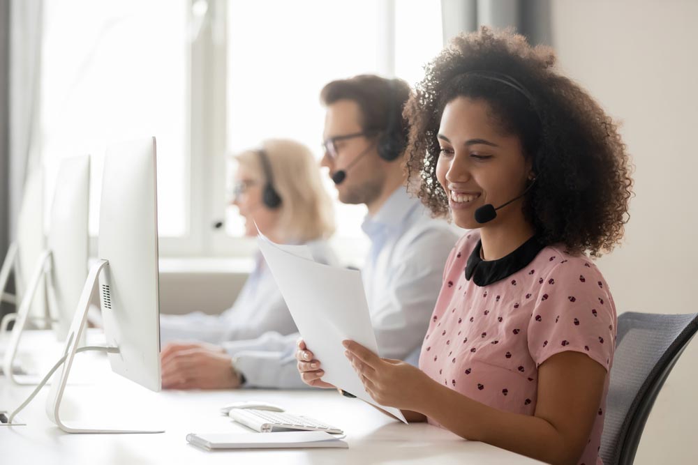 Smiling african american businesswoman call center operator agent