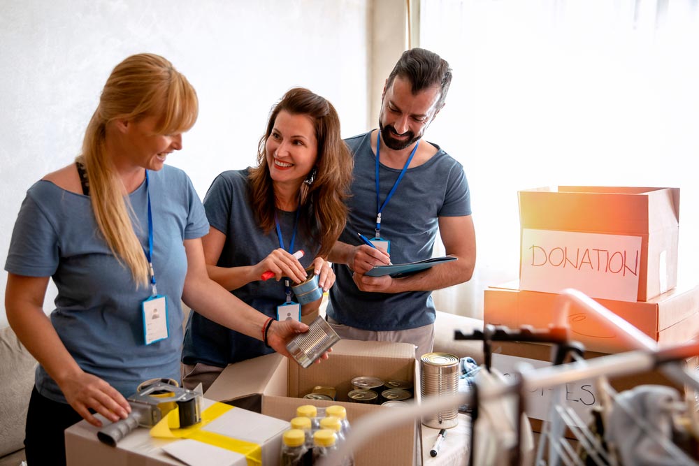 Volunteers working in charitable foundation Warehouse